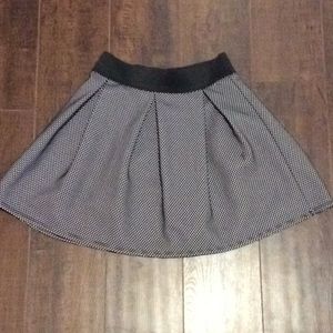 Black skirt with white polka dots